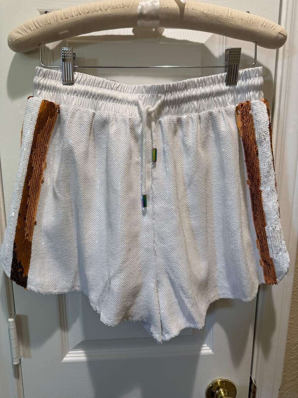 QUEEN OF SPARKLES White Athletic Shorts with Bronze Sequin Side Stripes